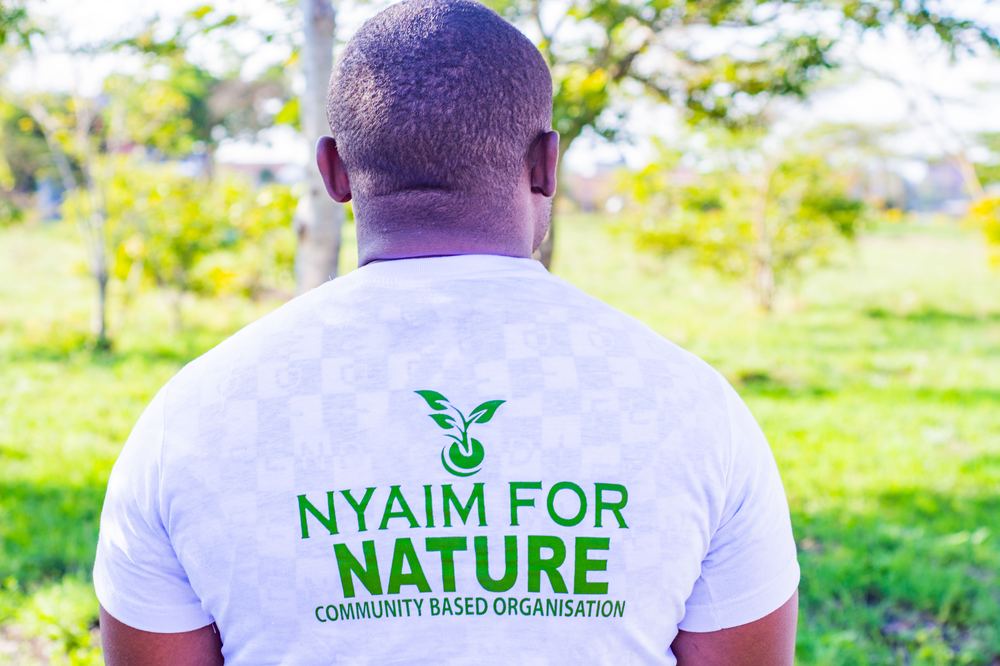 The back of a Nyaim for Nature Community Based Organisation t-shirt